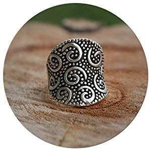 Wrapped in a unique antique silver retro retro ring